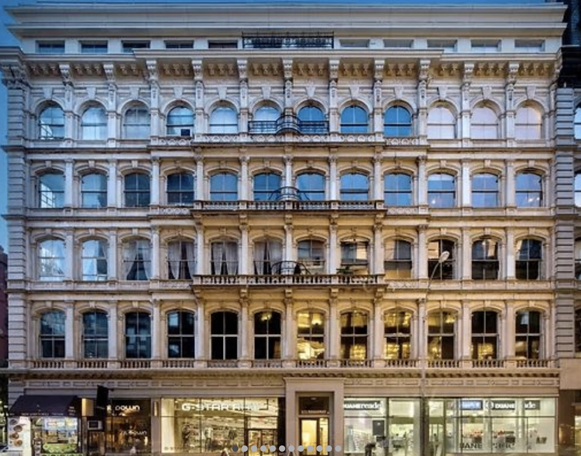 Historic venue building exterior with ornate architecture and multiple floors